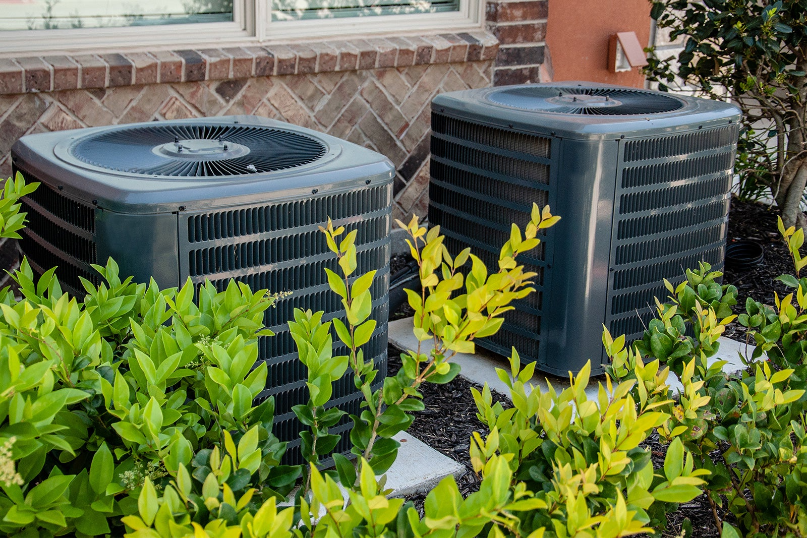 Two air conditioning units outside